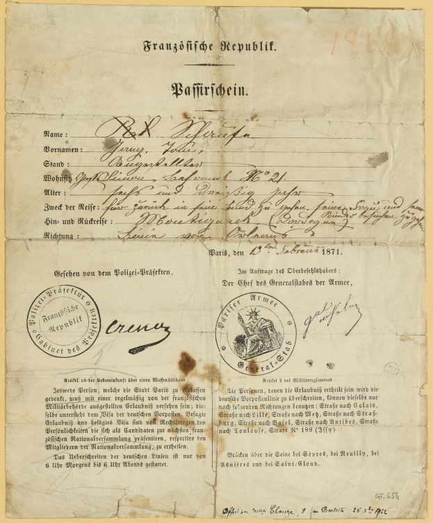 Alter deutscher Regierungsdokument mit einem kreisförmigen, schwarz umrandeten Stempel auf gelbem Papier.