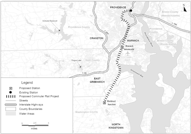 Eine schwarz-weiße Karte einer Stadt mit einem Fluss, beschriftet mit "Vorgeschlagenes Pendlerbahnprojekt" auf der linken Seite, das Straßen, Highways und andere Stadtmerkmale zeigt.